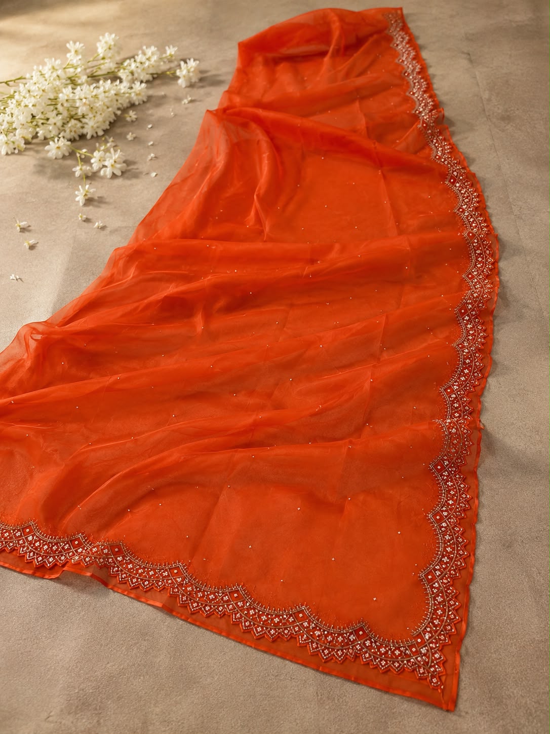 Sunset Glow Premium Organza Saree with Hand Embroidered Cutdana Border