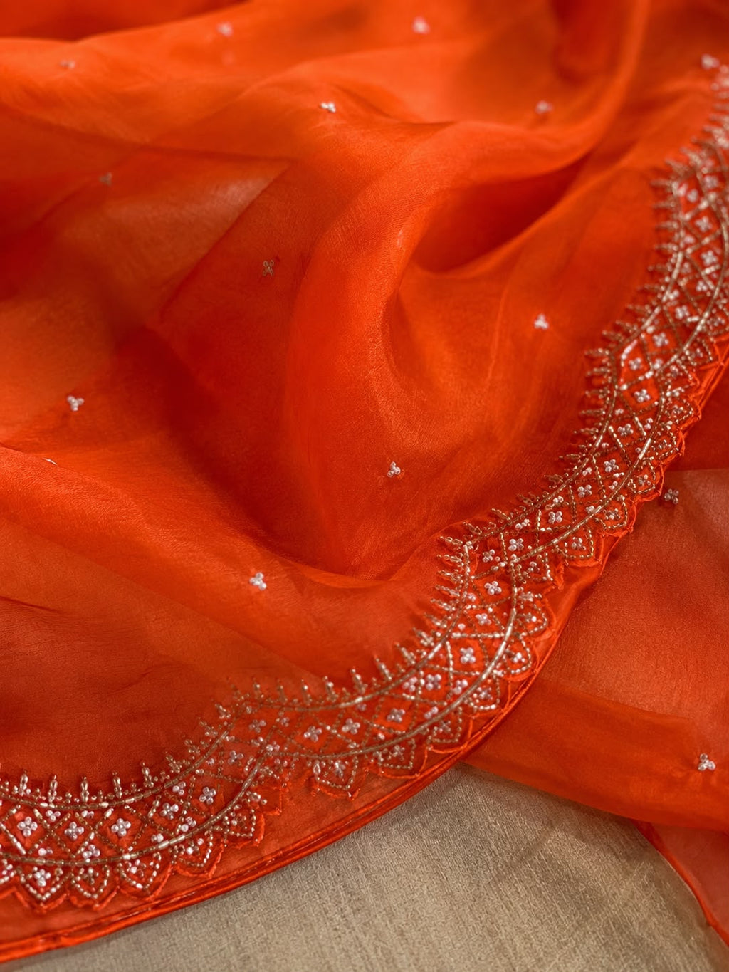 Sunset Glow Premium Organza Saree with Hand Embroidered Cutdana Border
