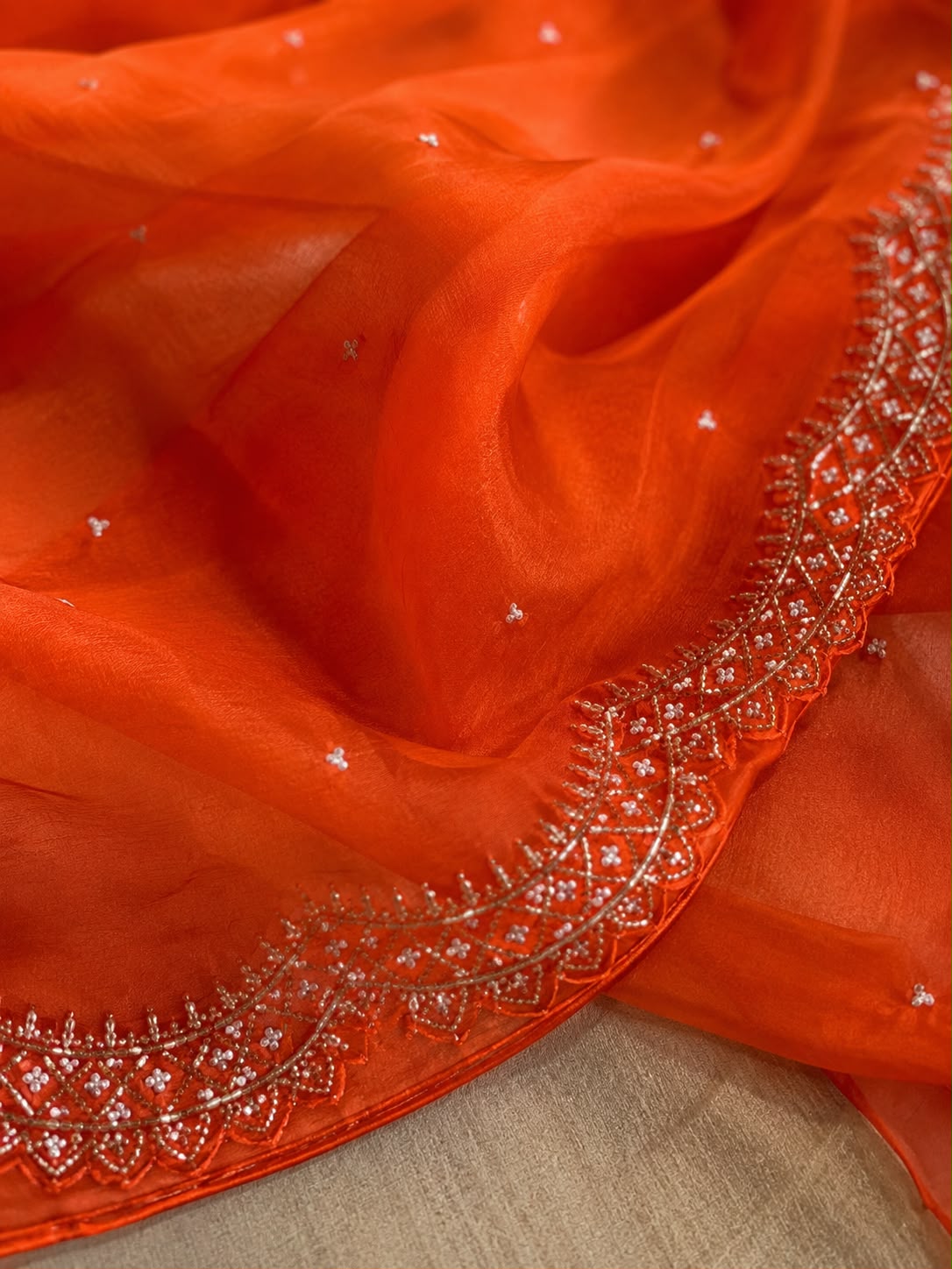Sunset Glow Premium Organza Saree with Hand Embroidered Cutdana Border